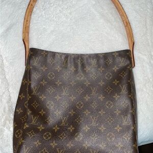 Louis Vuitton Looping. Beautiful and clean. The strap shows wear.